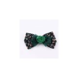 Emerald Rose Floral Bow hair accessory on white background view 1