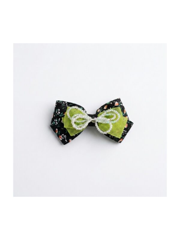 Black and lime lace bow hair clip on white background view 1