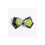 Black and lime lace bow hair clip on white background view 2