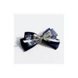 Navy lace floral bow hair clip on white background view 1