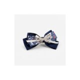 Navy lace floral bow hair clip on white background view 2