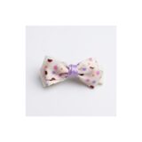 Pastel confetti dot ribbon bow hair clip on white background view 3